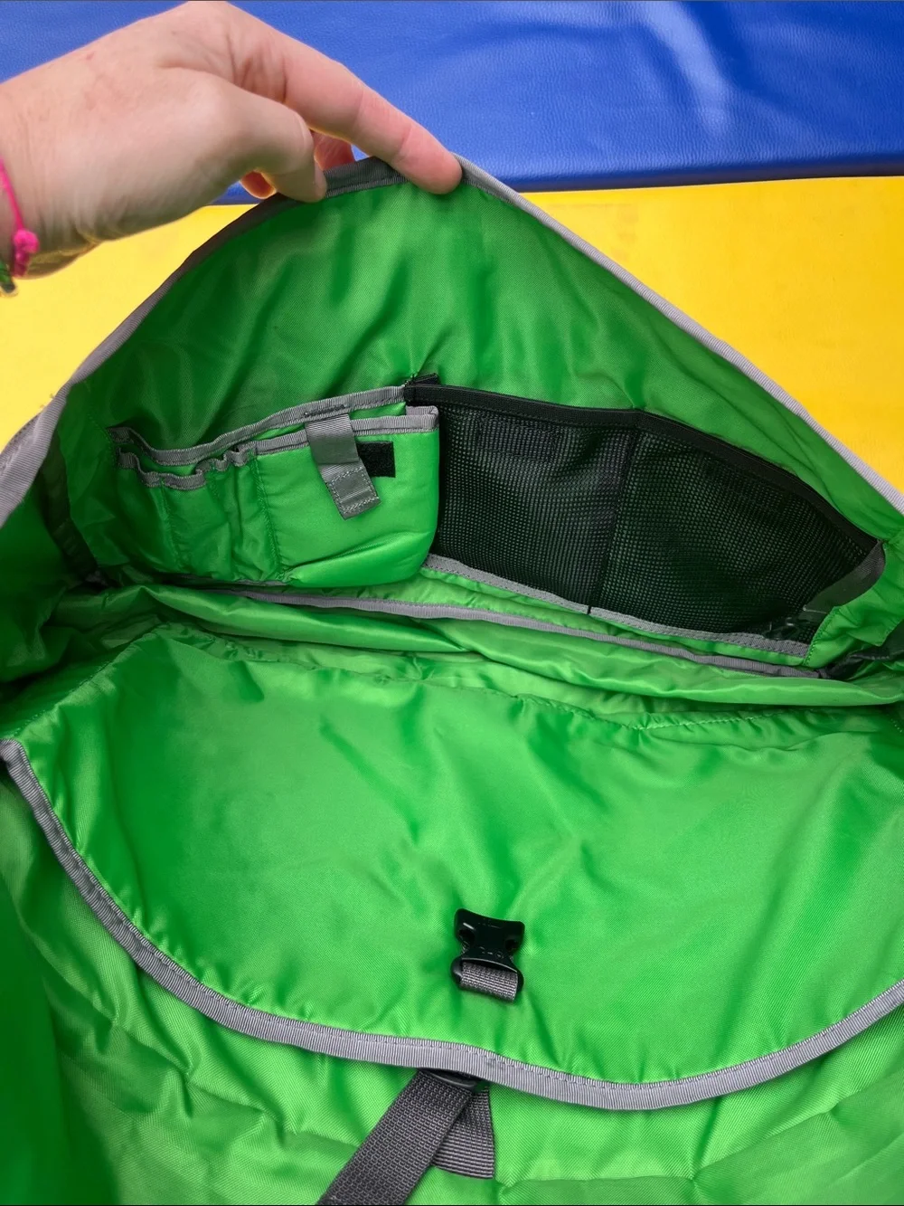 Patagonia’s Gray Messenger Bag with Green Accents older black hole